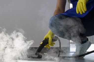 professional-cleaning-service-person-using-steam-cleaner-office professional-cleaning-service-person-using-steam-cleaner-office